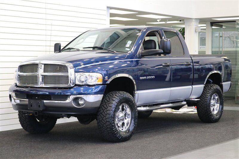 2003 Dodge Ram 2500 SLT 4dr Quad Cab  1-OWNER* 100% RUST FREE* SHORT BED HIGH OUTPUT CUMMINS 5.9L* 6-SPEED MANUAL* LEATHER* REAR AIRBAGS* BANKS EXAUST BRAKE* IN BED AUX FUEL TANK* ALL RECORDS SINCE NEW* WINDOW STICKER* 2-KEYS* 35 "NITTOs - Photo 3 - Portland, OR 97230