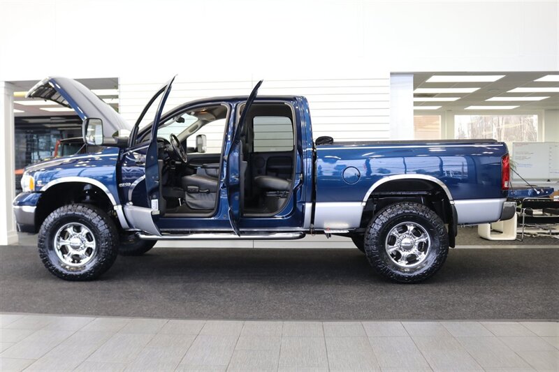 2003 Dodge Ram 2500 SLT 4dr Quad Cab  1-OWNER* 100% RUST FREE* SHORT BED HIGH OUTPUT CUMMINS 5.9L* 6-SPEED MANUAL* LEATHER* REAR AIRBAGS* BANKS EXAUST BRAKE* IN BED AUX FUEL TANK* ALL RECORDS SINCE NEW* WINDOW STICKER* 2-KEYS* 35 "NITTOs - Photo 10 - Portland, OR 97230