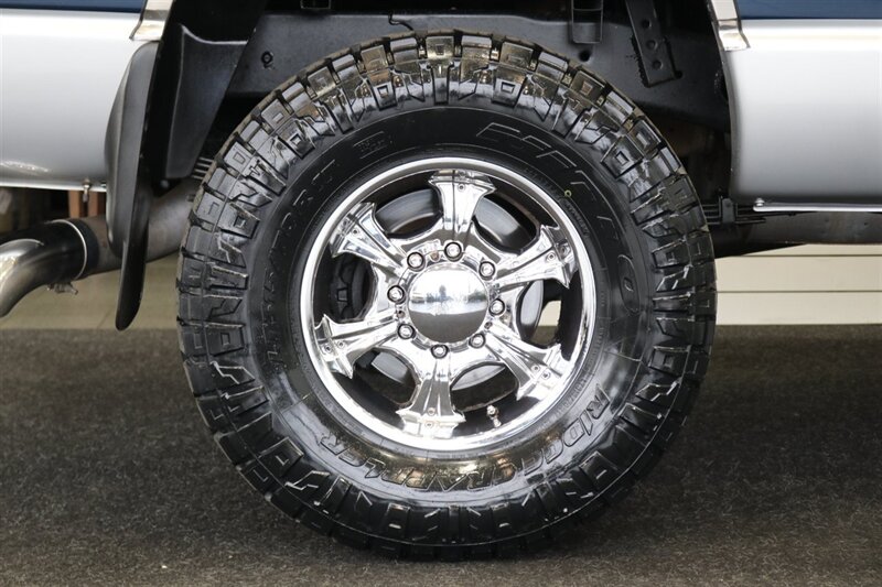 2003 Dodge Ram 2500 SLT 4dr Quad Cab  1-OWNER* 100% RUST FREE* SHORT BED HIGH OUTPUT CUMMINS 5.9L* 6-SPEED MANUAL* LEATHER* REAR AIRBAGS* BANKS EXAUST BRAKE* IN BED AUX FUEL TANK* ALL RECORDS SINCE NEW* WINDOW STICKER* 2-KEYS* 35 "NITTOs - Photo 52 - Portland, OR 97230