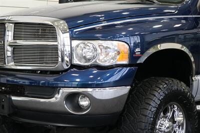 2003 Dodge Ram 2500 SLT 4dr Quad Cab  1-OWNER* 100% RUST FREE* SHORT BED HIGH OUTPUT CUMMINS 5.9L* 6-SPEED MANUAL* LEATHER* REAR AIRBAGS* BANKS EXAUST BRAKE* IN BED AUX FUEL TANK* ALL RECORDS SINCE NEW* WINDOW STICKER* 2-KEYS* 35 "NITTOs - Photo 12 - Portland, OR 97230
