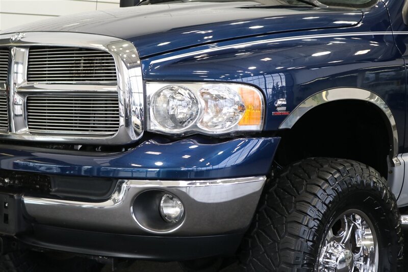 2003 Dodge Ram 2500 SLT 4dr Quad Cab  1-OWNER* 100% RUST FREE* SHORT BED HIGH OUTPUT CUMMINS 5.9L* 6-SPEED MANUAL* LEATHER* REAR AIRBAGS* BANKS EXAUST BRAKE* IN BED AUX FUEL TANK* ALL RECORDS SINCE NEW* WINDOW STICKER* 2-KEYS* 35 "NITTOs - Photo 12 - Portland, OR 97230