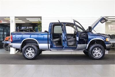 2003 Dodge Ram 2500 SLT 4dr Quad Cab  1-OWNER* 100% RUST FREE* SHORT BED HIGH OUTPUT CUMMINS 5.9L* 6-SPEED MANUAL* LEATHER* REAR AIRBAGS* BANKS EXAUST BRAKE* IN BED AUX FUEL TANK* ALL RECORDS SINCE NEW* WINDOW STICKER* 2-KEYS* 35 "NITTOs - Photo 11 - Portland, OR 97230