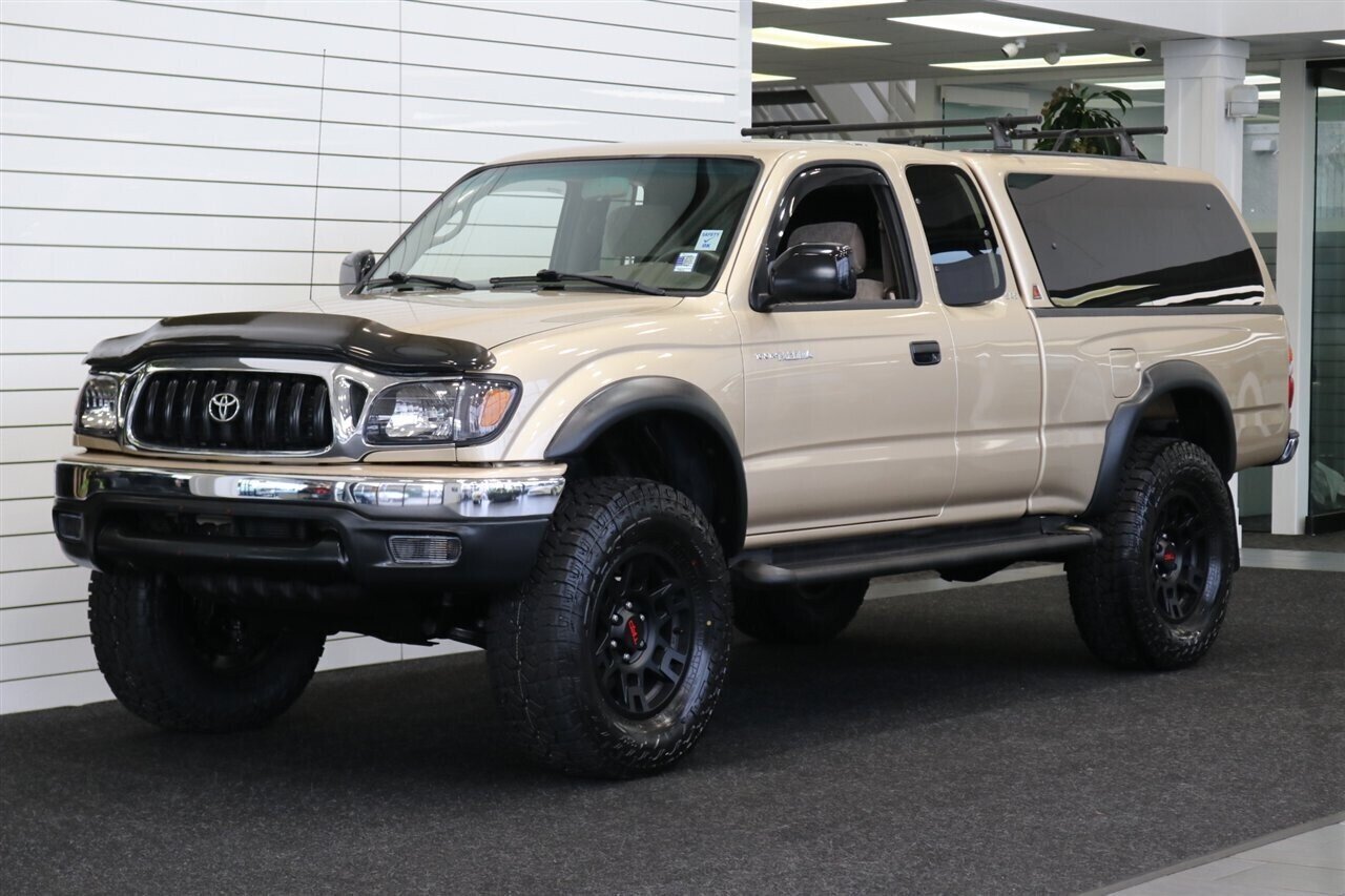 2002 Toyota Tacoma V6  1-OWNER* 0-RUST* NEW TIMING BELT-WATER PUMP-TUNE UP-FLUIDS* NEW BILSTEIN TOYTEC LEVEL KIT W/BILSTEIN 5100 SHOCKS* NEW 17 " TRD PRO WHEELS & 33 " FALKEN WILD PEAKS A/T 4W* ALL BOOKS-RECORDS SINCE NEW - Photo 1 - Portland, OR 97230
