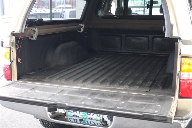 2002 Toyota Tacoma V6 1-OWNER* 0-RUST* NEW TIMING BELT-WATER PUMP-TUNE UP-FLUIDS* NEW BILSTEIN TOYTEC LEVEL KIT W/BILSTEIN 5100 SHOCKS* NEW 17 " TRD PRO WHEELS & 33 " FALKEN WILD PEAKS A/T 4W* ALL BOOKS-RECORDS SINCE NEW - Photo 45 - Portland, OR 97230