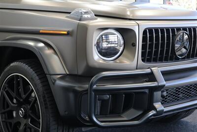 2025 Mercedes-Benz AMG G 63  1-OWNER* FULL PPF ON FRONT NOSE* MONZA GREY MAGNO-CARBON FIBER INTERIOR TRIM-22 " AMG WHEELS-EXCLUSIVE INTERIOR PLUS-AMG NIGHT PACKAGE MAGNOAMG PERFORMANCE STEERING WHEEL-BLACK MAGNO ROOF* - Photo 11 - Portland, OR 97230