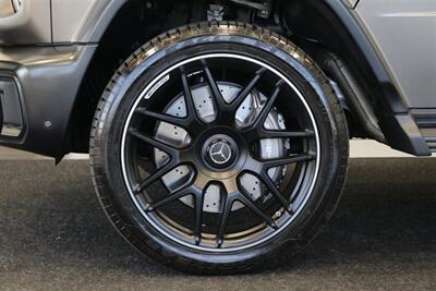2025 Mercedes-Benz AMG G 63  1-OWNER* FULL PPF ON FRONT NOSE* MONZA GREY MAGNO-CARBON FIBER INTERIOR TRIM-22 " AMG WHEELS-EXCLUSIVE INTERIOR PLUS-AMG NIGHT PACKAGE MAGNOAMG PERFORMANCE STEERING WHEEL-BLACK MAGNO ROOF* - Photo 32 - Portland, OR 97230