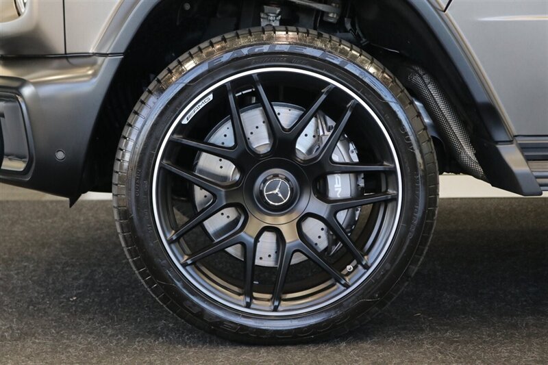 2025 Mercedes-Benz AMG G 63  1-OWNER* FULL PPF ON FRONT NOSE* MONZA GREY MAGNO-CARBON FIBER INTERIOR TRIM-22 " AMG WHEELS-EXCLUSIVE INTERIOR PLUS-AMG NIGHT PACKAGE MAGNOAMG PERFORMANCE STEERING WHEEL-BLACK MAGNO ROOF* - Photo 32 - Portland, OR 97230