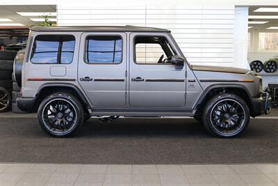 2025 Mercedes-Benz AMG G 63  1-OWNER* FULL PPF ON FRONT NOSE* MONZA GREY MAGNO-CARBON FIBER INTERIOR TRIM-22 " AMG WHEELS-EXCLUSIVE INTERIOR PLUS-AMG NIGHT PACKAGE MAGNOAMG PERFORMANCE STEERING WHEEL-BLACK MAGNO ROOF* - Photo 5 - Portland, OR 97230