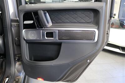 2025 Mercedes-Benz AMG G 63  1-OWNER* FULL PPF ON FRONT NOSE* MONZA GREY MAGNO-CARBON FIBER INTERIOR TRIM-22 " AMG WHEELS-EXCLUSIVE INTERIOR PLUS-AMG NIGHT PACKAGE MAGNOAMG PERFORMANCE STEERING WHEEL-BLACK MAGNO ROOF* - Photo 43 - Portland, OR 97230