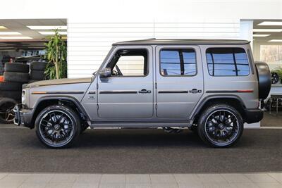 2025 Mercedes-Benz AMG G 63  1-OWNER* FULL PPF ON FRONT NOSE* MONZA GREY MAGNO-CARBON FIBER INTERIOR TRIM-22 " AMG WHEELS-EXCLUSIVE INTERIOR PLUS-AMG NIGHT PACKAGE MAGNOAMG PERFORMANCE STEERING WHEEL-BLACK MAGNO ROOF* - Photo 4 - Portland, OR 97230