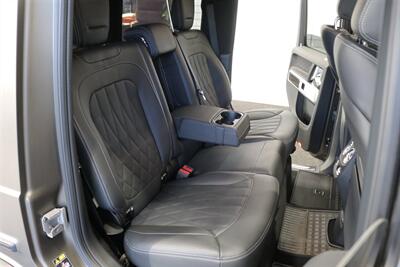 2025 Mercedes-Benz AMG G 63  1-OWNER* FULL PPF ON FRONT NOSE* MONZA GREY MAGNO-CARBON FIBER INTERIOR TRIM-22 " AMG WHEELS-EXCLUSIVE INTERIOR PLUS-AMG NIGHT PACKAGE MAGNOAMG PERFORMANCE STEERING WHEEL-BLACK MAGNO ROOF* - Photo 19 - Portland, OR 97230
