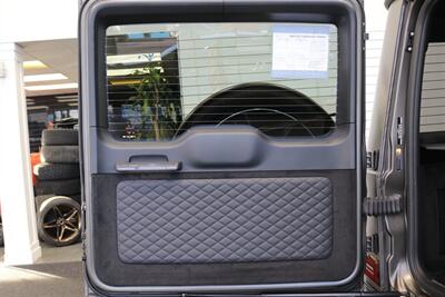 2025 Mercedes-Benz AMG G 63  1-OWNER* FULL PPF ON FRONT NOSE* MONZA GREY MAGNO-CARBON FIBER INTERIOR TRIM-22 " AMG WHEELS-EXCLUSIVE INTERIOR PLUS-AMG NIGHT PACKAGE MAGNOAMG PERFORMANCE STEERING WHEEL-BLACK MAGNO ROOF* - Photo 51 - Portland, OR 97230