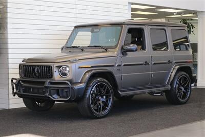 2025 Mercedes-Benz AMG G 63  1-OWNER* FULL PPF ON FRONT NOSE* MONZA GREY MAGNO-CARBON FIBER INTERIOR TRIM-22 " AMG WHEELS-EXCLUSIVE INTERIOR PLUS-AMG NIGHT PACKAGE MAGNOAMG PERFORMANCE STEERING WHEEL-BLACK MAGNO ROOF* - Photo 1 - Portland, OR 97230