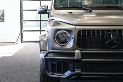 2025 Mercedes-Benz AMG G 63  1-OWNER* FULL PPF ON FRONT NOSE* MONZA GREY MAGNO-CARBON FIBER INTERIOR TRIM-22 " AMG WHEELS-EXCLUSIVE INTERIOR PLUS-AMG NIGHT PACKAGE MAGNOAMG PERFORMANCE STEERING WHEEL-BLACK MAGNO ROOF* - Photo 13 - Portland, OR 97230