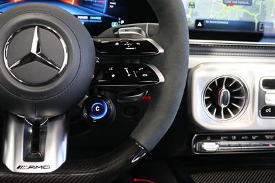 2025 Mercedes-Benz AMG G 63  1-OWNER* FULL PPF ON FRONT NOSE* MONZA GREY MAGNO-CARBON FIBER INTERIOR TRIM-22 " AMG WHEELS-EXCLUSIVE INTERIOR PLUS-AMG NIGHT PACKAGE MAGNOAMG PERFORMANCE STEERING WHEEL-BLACK MAGNO ROOF* - Photo 47 - Portland, OR 97230