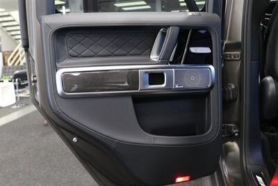 2025 Mercedes-Benz AMG G 63  1-OWNER* FULL PPF ON FRONT NOSE* MONZA GREY MAGNO-CARBON FIBER INTERIOR TRIM-22 " AMG WHEELS-EXCLUSIVE INTERIOR PLUS-AMG NIGHT PACKAGE MAGNOAMG PERFORMANCE STEERING WHEEL-BLACK MAGNO ROOF* - Photo 42 - Portland, OR 97230