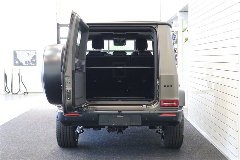 2025 Mercedes-Benz AMG G 63  1-OWNER* FULL PPF ON FRONT NOSE* MONZA GREY MAGNO-CARBON FIBER INTERIOR TRIM-22 " AMG WHEELS-EXCLUSIVE INTERIOR PLUS-AMG NIGHT PACKAGE MAGNOAMG PERFORMANCE STEERING WHEEL-BLACK MAGNO ROOF* - Photo 31 - Portland, OR 97230