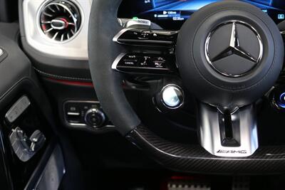 2025 Mercedes-Benz AMG G 63  1-OWNER* FULL PPF ON FRONT NOSE* MONZA GREY MAGNO-CARBON FIBER INTERIOR TRIM-22 " AMG WHEELS-EXCLUSIVE INTERIOR PLUS-AMG NIGHT PACKAGE MAGNOAMG PERFORMANCE STEERING WHEEL-BLACK MAGNO ROOF* - Photo 46 - Portland, OR 97230