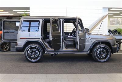 2025 Mercedes-Benz AMG G 63  1-OWNER* FULL PPF ON FRONT NOSE* MONZA GREY MAGNO-CARBON FIBER INTERIOR TRIM-22 " AMG WHEELS-EXCLUSIVE INTERIOR PLUS-AMG NIGHT PACKAGE MAGNOAMG PERFORMANCE STEERING WHEEL-BLACK MAGNO ROOF* - Photo 53 - Portland, OR 97230
