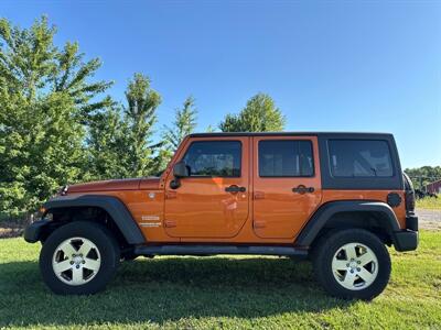 2011 Jeep Wrangler Unlimited Sport   - Photo 1 - Rushville, IN 46173