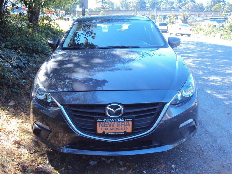 The 2014 Mazda Mazda3 i Touring photos