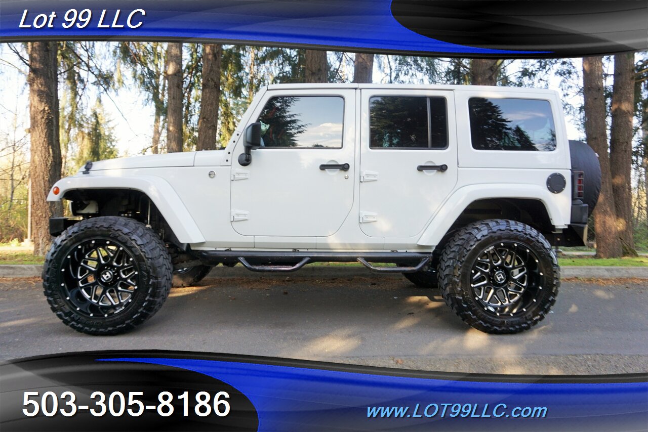 2014 Jeep Wrangler Unlimited Sahara 4x4 RED Leather Seats HARD TOP   - Photo 1 - Milwaukie, OR 97267