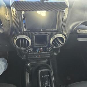 2015 Jeep Wrangler Unlimited Freedom Edition - Photo 17 - West Haven, UT 84401