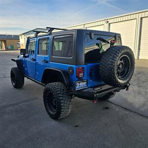 2015 Jeep Wrangler Unlimited Freedom Edition - Photo 4 - West Haven, UT 84401