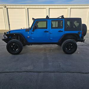 2015 Jeep Wrangler Unlimited Freedom Edition - Photo 3 - West Haven, UT 84401