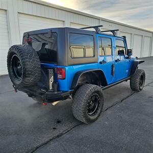 2015 Jeep Wrangler Unlimited Freedom Edition - Photo 5 - West Haven, UT 84401
