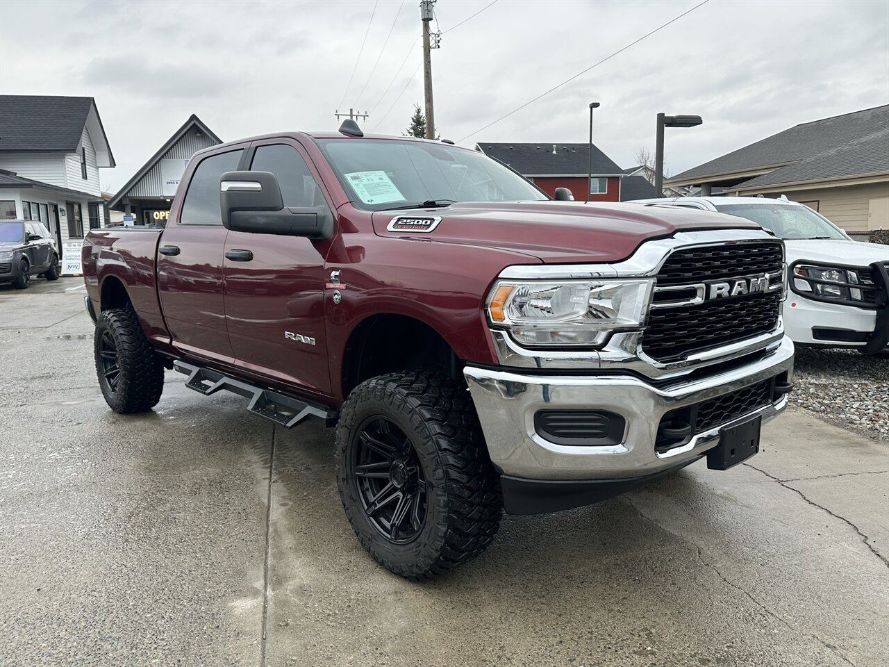 2024 RAM 2500 Big Horn. Factory Lift with Custom Brand Wheels and Tires, 4k miles, Superb truck! - Photo 1 - Post Falls, ID 83854