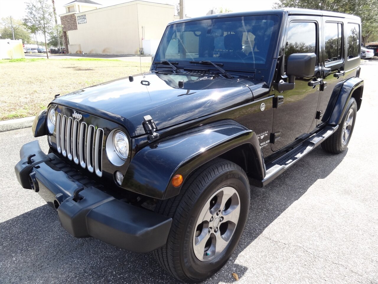 2017 Jeep Wrangler Unlimited Sahara   - Photo 2 - Deland, FL 32720