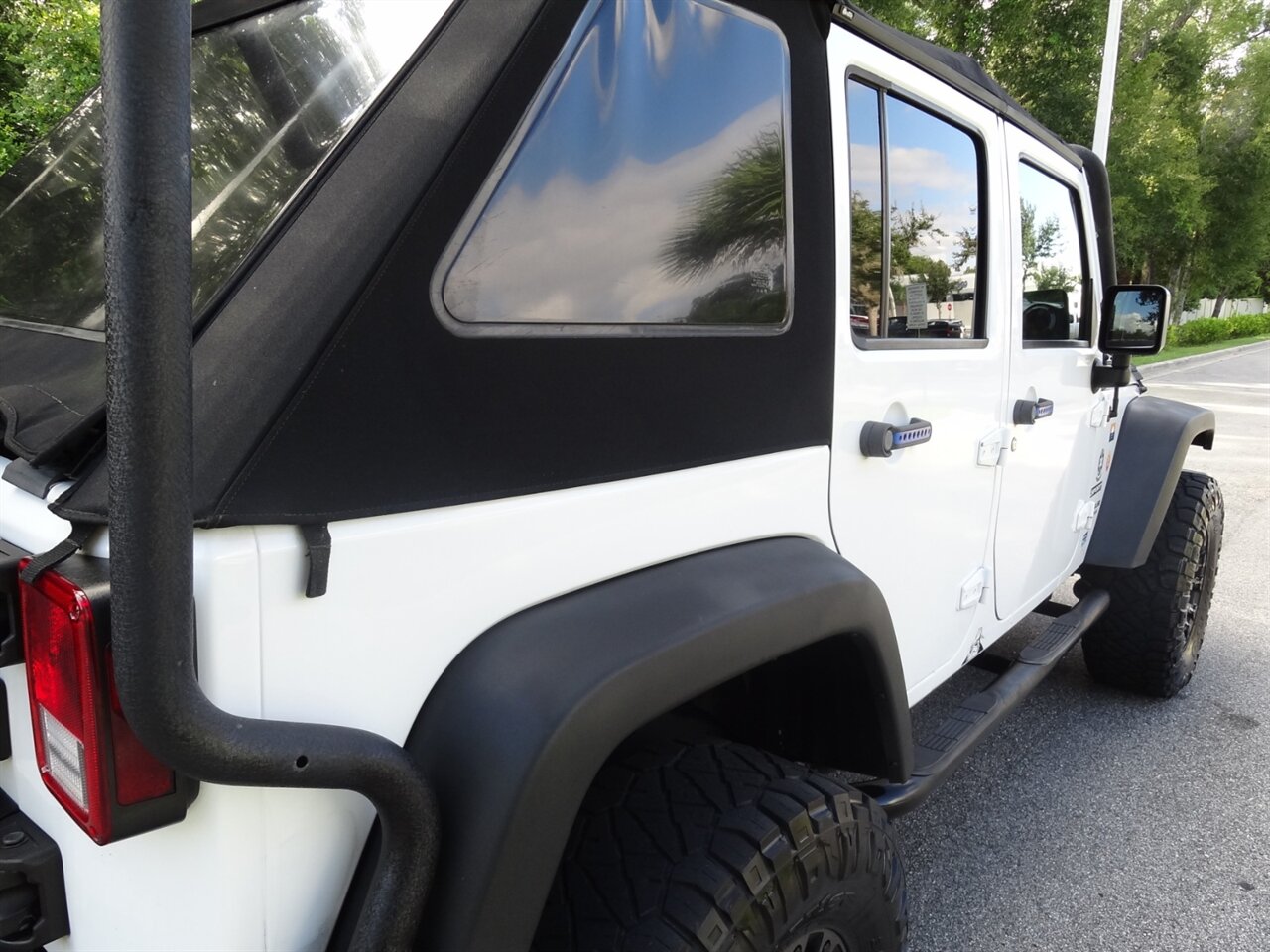 2016 Jeep Wrangler Unlimited Sport 4X4 - Photo 16 - Deland, FL 32720