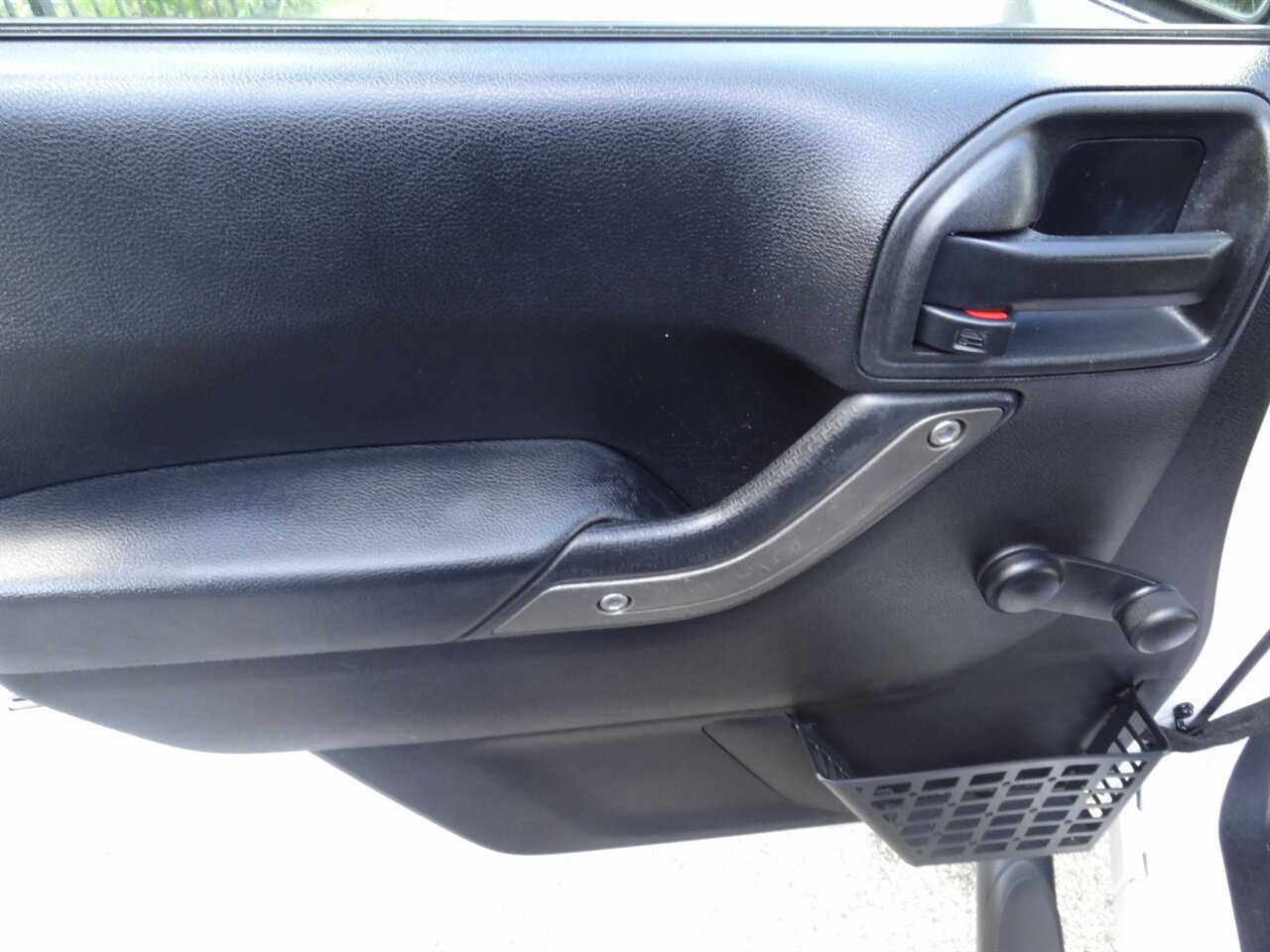 2016 Jeep Wrangler Unlimited Sport 4X4 - Photo 38 - Deland, FL 32720