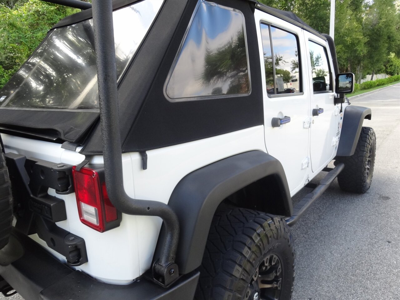 2016 Jeep Wrangler Unlimited Sport 4X4 - Photo 25 - Deland, FL 32720