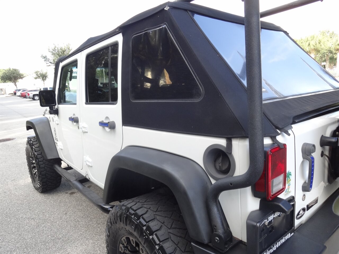 2016 Jeep Wrangler Unlimited Sport 4X4 - Photo 24 - Deland, FL 32720