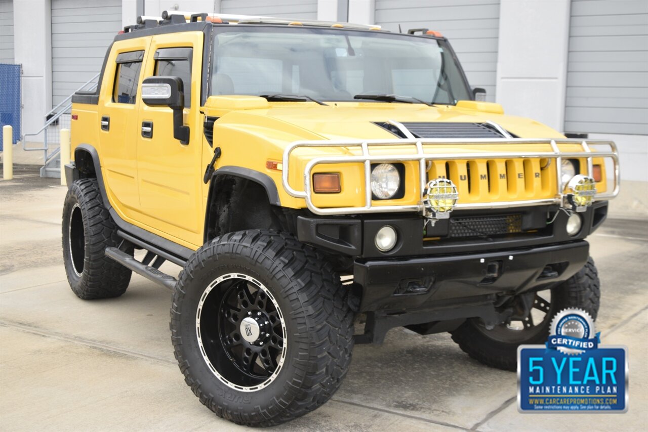 2006 Hummer H2 SUT LUXURY LIFTED ROOF REAR DVD PREM WHLS   - Photo 23 - Stafford, TX 77477