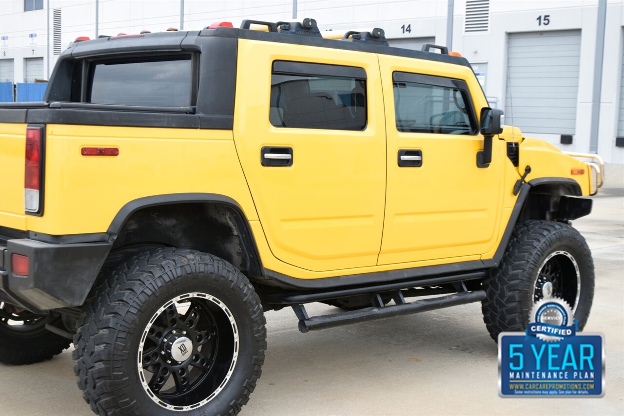 2006 Hummer H2 SUT LUXURY LIFTED ROOF REAR DVD PREM WHLS   - Photo 17 - Stafford, TX 77477