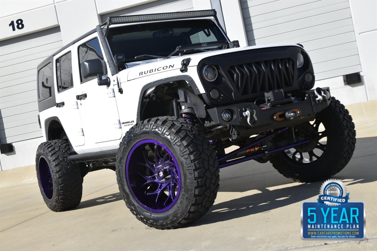 2016 Jeep Wrangler UNLTD RUBICON 4X4 PROFESSIONALY LIFTED HEAD TURNER   - Photo 24 - Stafford, TX 77477