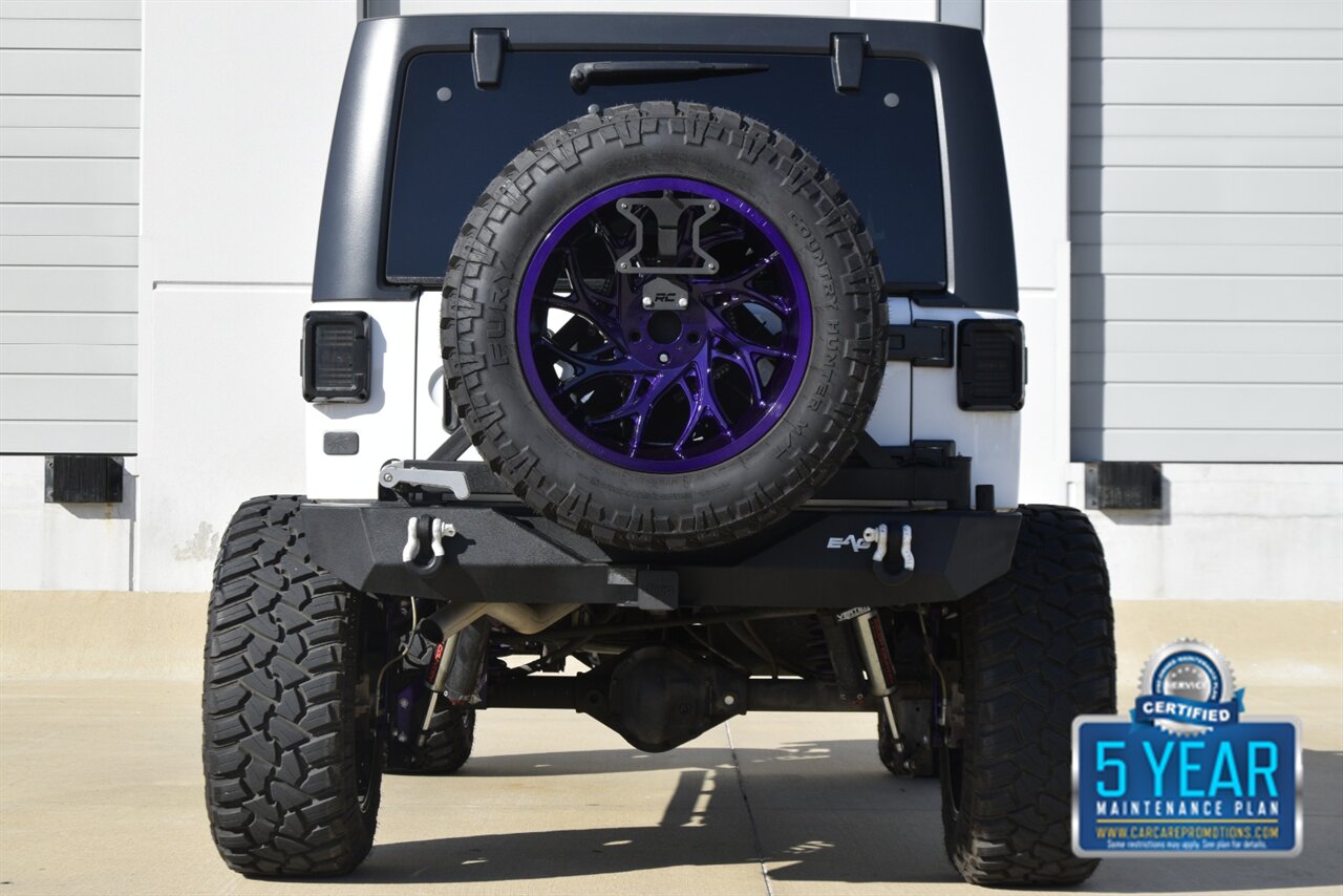 2016 Jeep Wrangler UNLTD RUBICON 4X4 PROFESSIONALY LIFTED HEAD TURNER   - Photo 23 - Stafford, TX 77477