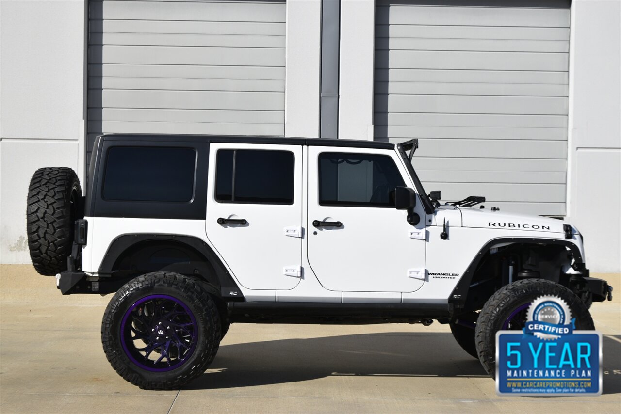 2016 Jeep Wrangler UNLTD RUBICON 4X4 PROFESSIONALY LIFTED HEAD TURNER   - Photo 14 - Stafford, TX 77477