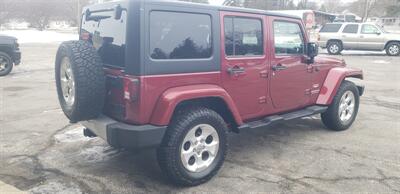 2013 Jeep Wrangler Unlimited Sahara   - Photo 6 - Hemlock, MI 48626