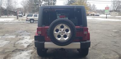 2013 Jeep Wrangler Unlimited Sahara   - Photo 5 - Hemlock, MI 48626