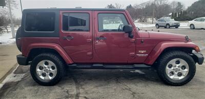 2013 Jeep Wrangler Unlimited Sahara   - Photo 7 - Hemlock, MI 48626