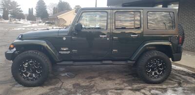 2011 Jeep Wrangler Unlimited Sahara   - Photo 3 - Hemlock, MI 48626