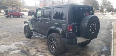 2011 Jeep Wrangler Unlimited Sahara   - Photo 4 - Hemlock, MI 48626