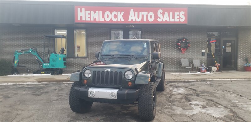 2011 Jeep Wrangler Unlimited Sahara   - Photo 1 - Hemlock, MI 48626