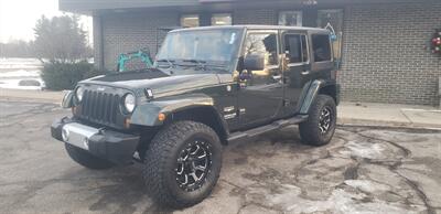 2011 Jeep Wrangler Unlimited Sahara   - Photo 2 - Hemlock, MI 48626