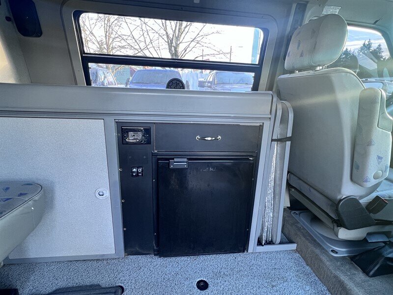 1997 Volkswagen EuroVan Campmobile 2L NA V6 single overhead cam (SOHC) 12V, Van Camper, VW Camper, Compact Camper, Cloth interior, Awning, Dinning tables, Sleeping Bed, Mini Fridge, Mobile shower - Photo 21 - Milwaukie, OR 97267