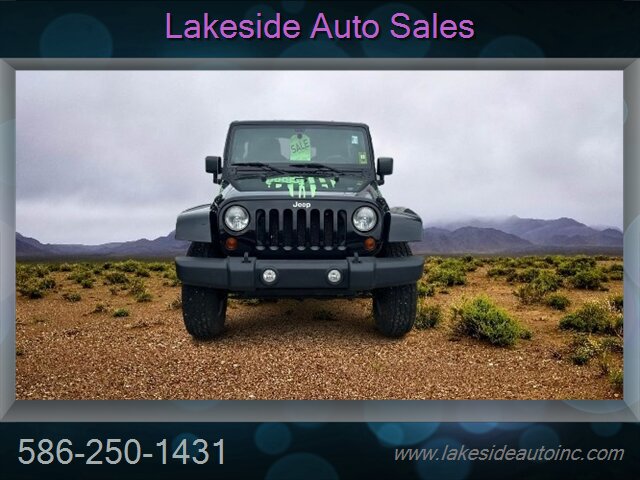 2012 Jeep Wrangler Unlimited Sahara   - Photo 2 - Clinton Township, MI 48036